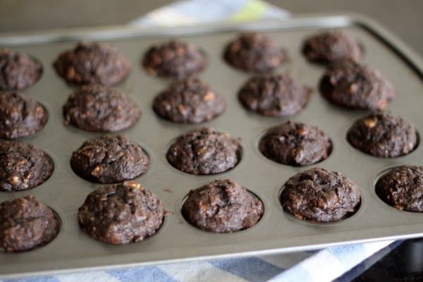 double chocolate banana muffins cooling on counter, foodlets