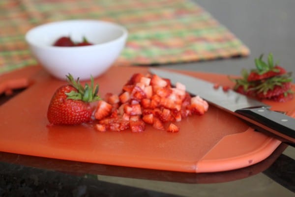 slicing fresh strawberries