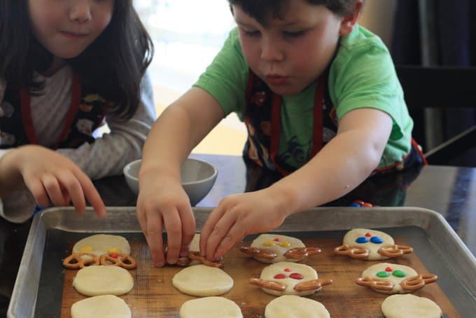 George and Estelle assembling reindeer sugar cookies