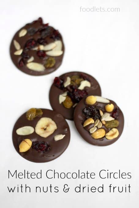 melted chocolate circles with nuts & dried fruit