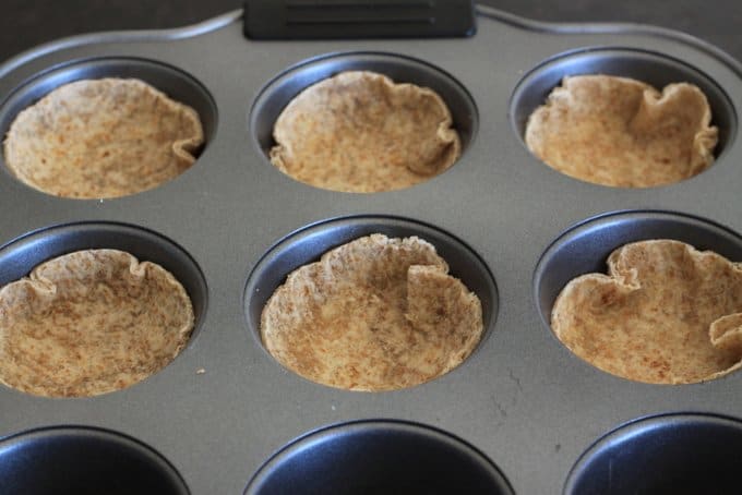 tortillas in a muffin pan