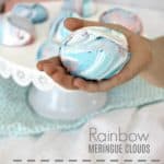 rainbow meringue cookies in hand