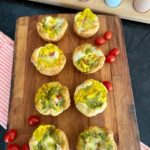 pesto quiche cups with biscuit dough